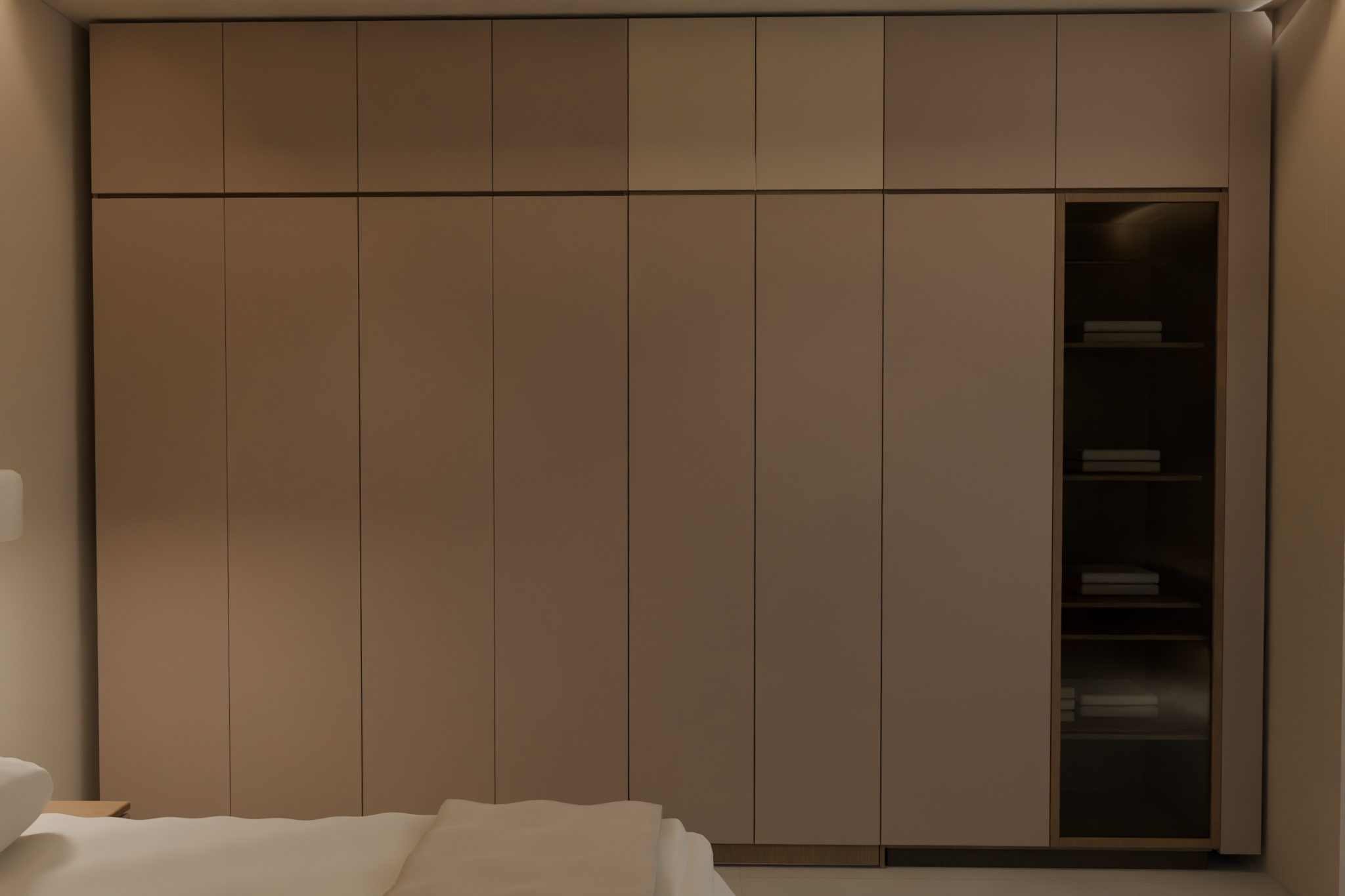 Warm-greige cupboard fronts with the existing walk-in entrance concealed behind matching panels.